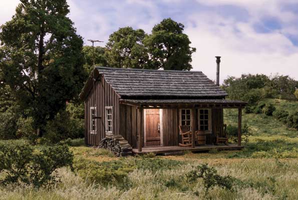 Woodland Scenics Rustic Cabin - Built-&-Ready(R) Landmark Structure(R) w/Exterior Light -- Assembled - 3-1/4 x 3 x 2-13/16" 8.3 x 7.6 x 7.1cm (WOOBR5065)